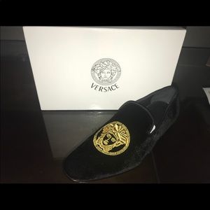 Versace loafers.